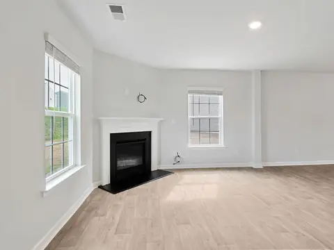 A ceiling vent in a bright room